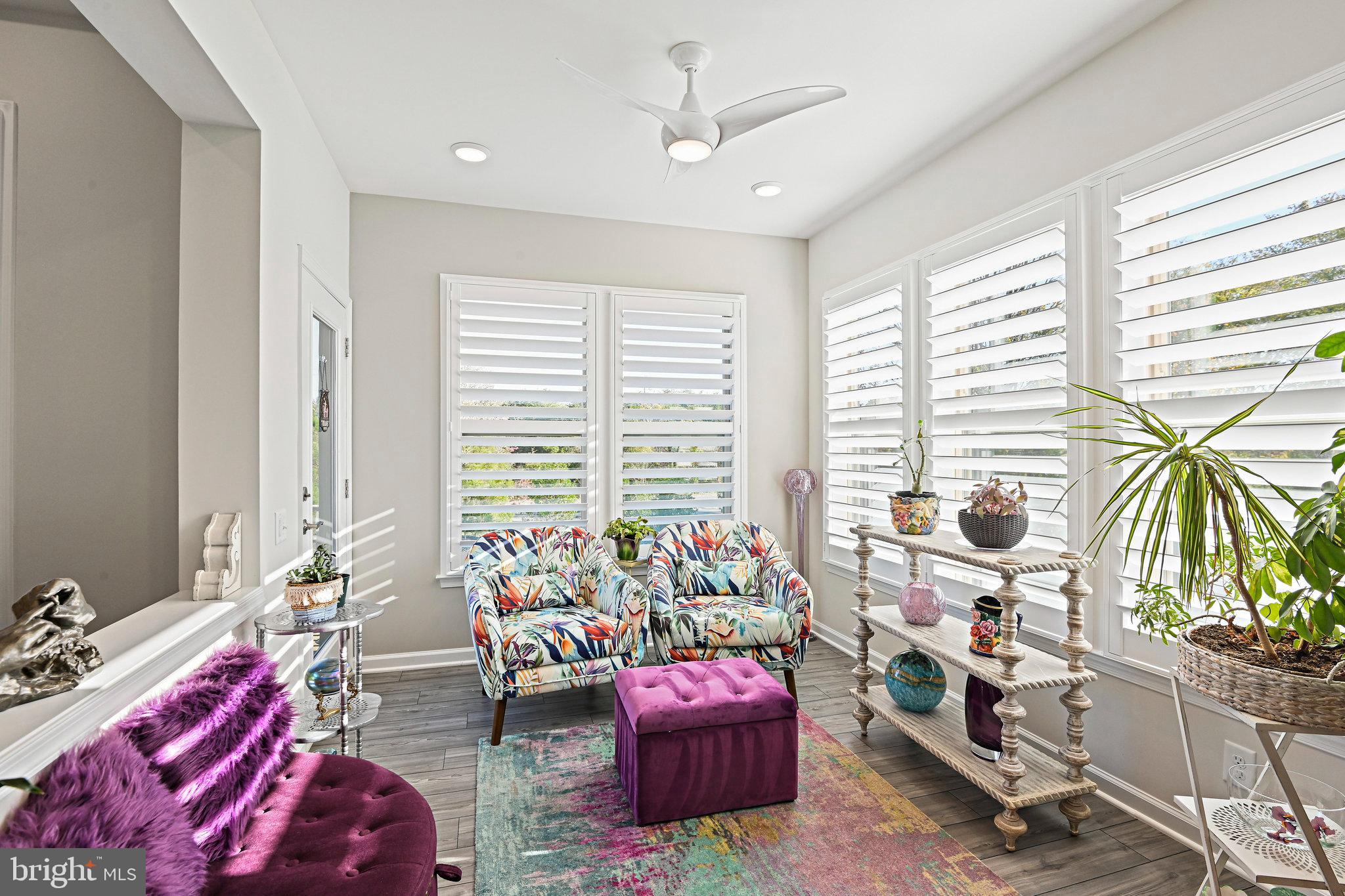 15788 Gardenia Rdg Way Haymarket, VA 20169 - Photo 16 of 50 a living room with furniture and a potted plant