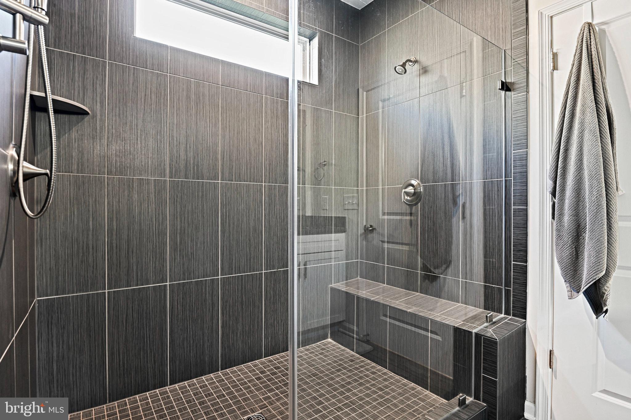 15788 Gardenia Rdg Way Haymarket, VA 20169 - Photo 22 of 50 a bathroom with a shower and a sink