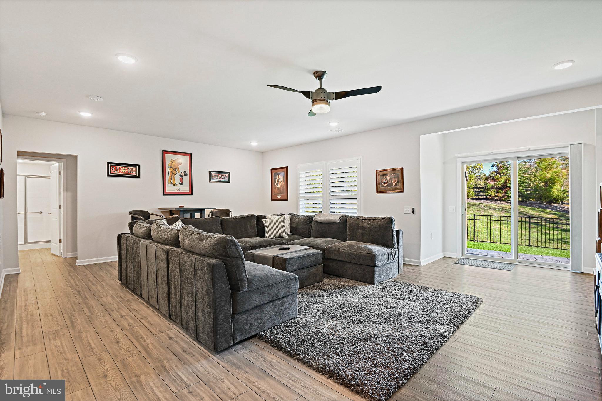 15788 Gardenia Rdg Way Haymarket, VA 20169 - Photo 31 of 50 a living room with furniture and a rug