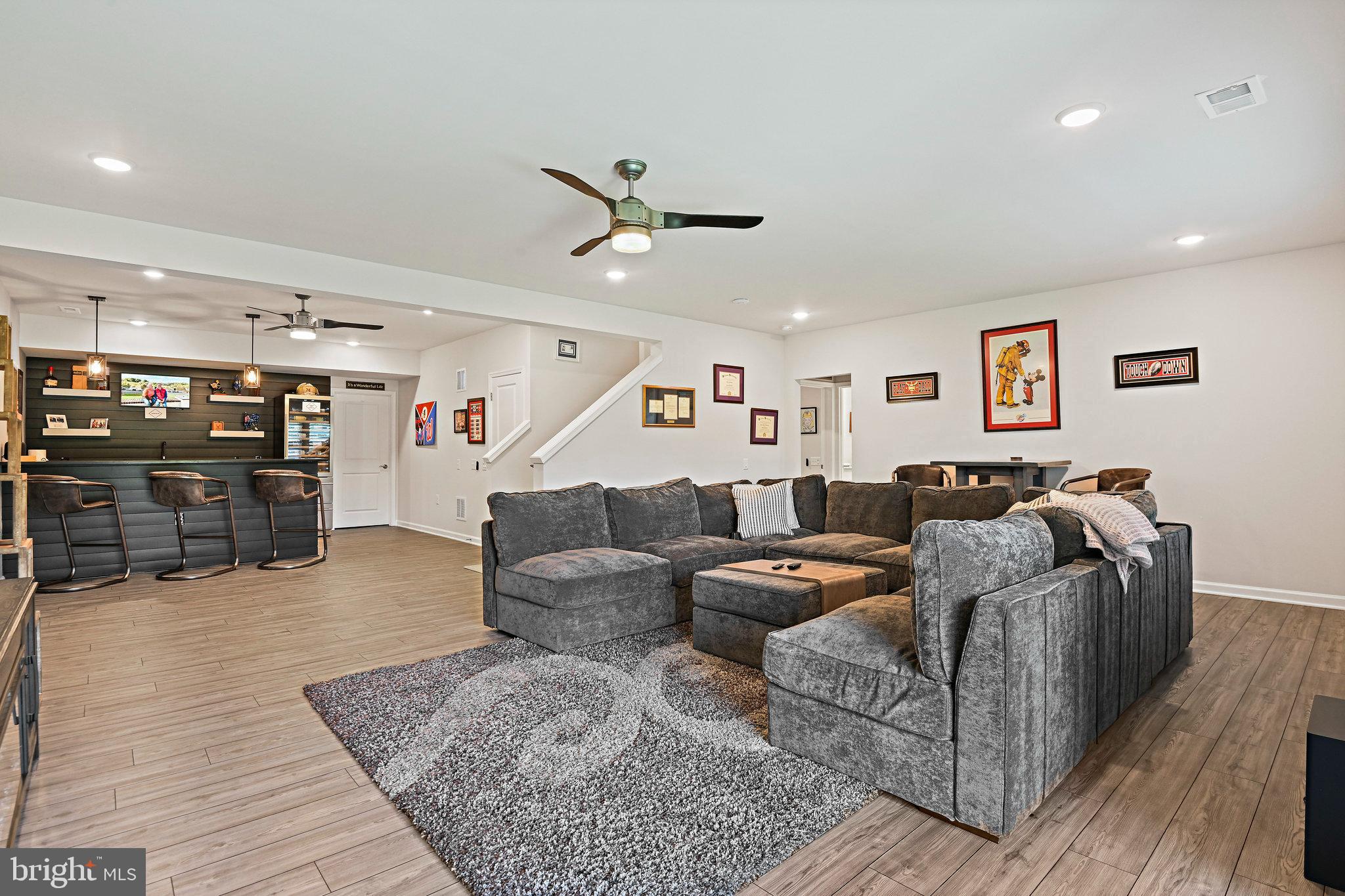 15788 Gardenia Rdg Way Haymarket, VA 20169 - Photo 32 of 50 a living room with furniture and kitchen view