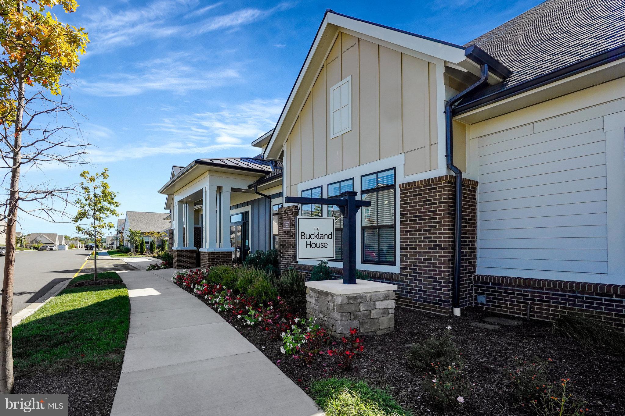 15788 Gardenia Rdg Way Haymarket, VA 20169 - Photo 46 of 50 a front view of a house with garden