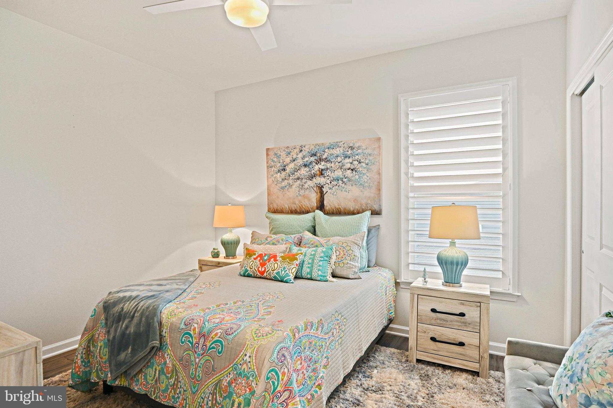 15788 Gardenia Rdg Way Haymarket, VA 20169 - Photo 10 of 50 a bedroom with a bed and a window