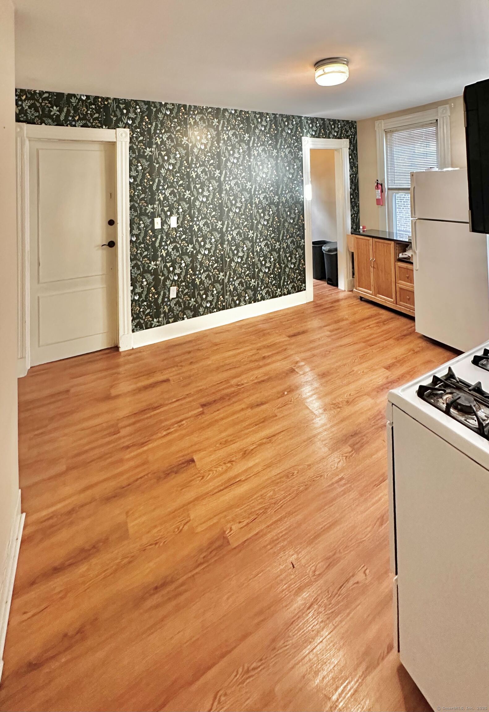 751 Orange Street, Unit 1 New Haven, CT 06511 - Photo 12 of 19 a view of kitchen with granite countertop cabinets and refrigerator