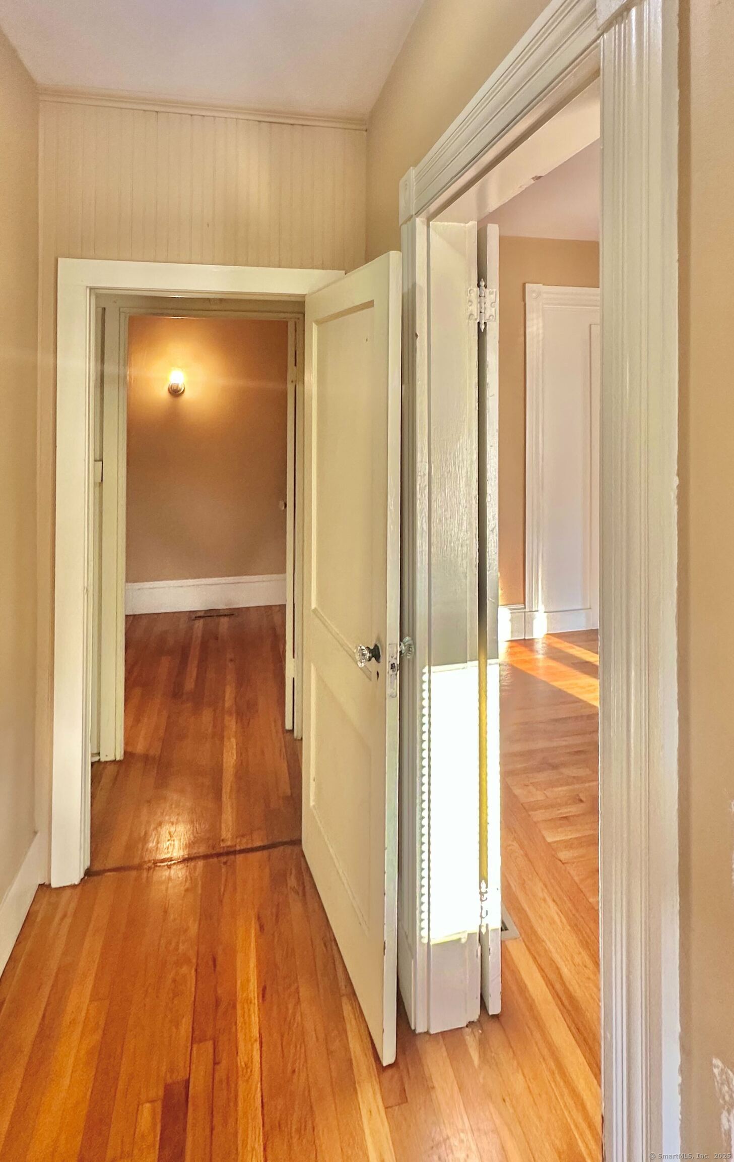 751 Orange Street, Unit 1 New Haven, CT 06511 - Photo 2 of 19 a view of a room with wooden floor and a bathroom