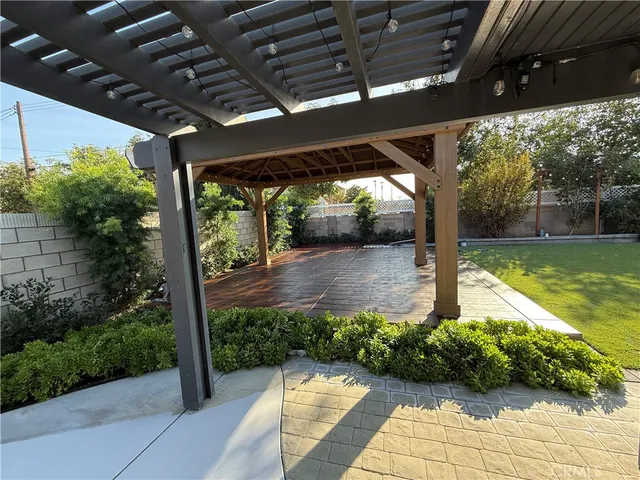 a view of a back yard of the house