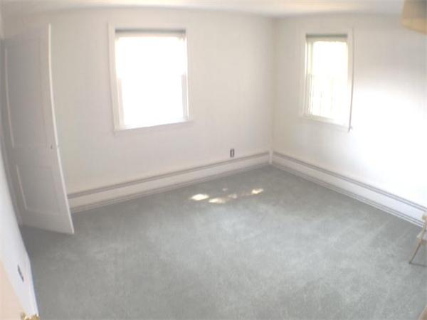 420 Parker Street Springfield, MA 01129 - Photo 8 of 16 an empty room with a window