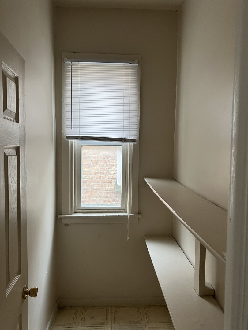 Undisclosed Address Chicago, IL 60624 - Photo 13 of 16 a view of room with window