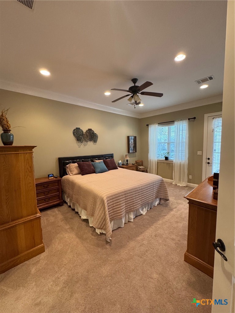 2306 Arroyo Grande Leander, TX 78641 - Photo 18 of 44 a bedroom with a bed and furniture