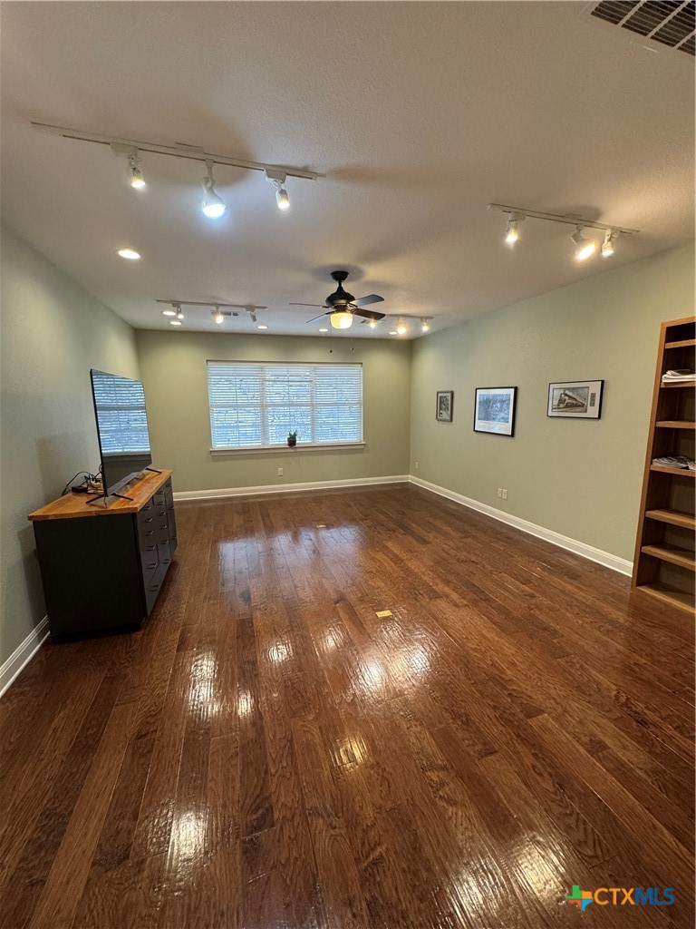 2306 Arroyo Grande Leander, TX 78641 - Photo 22 of 44 a view of a room with wooden floor