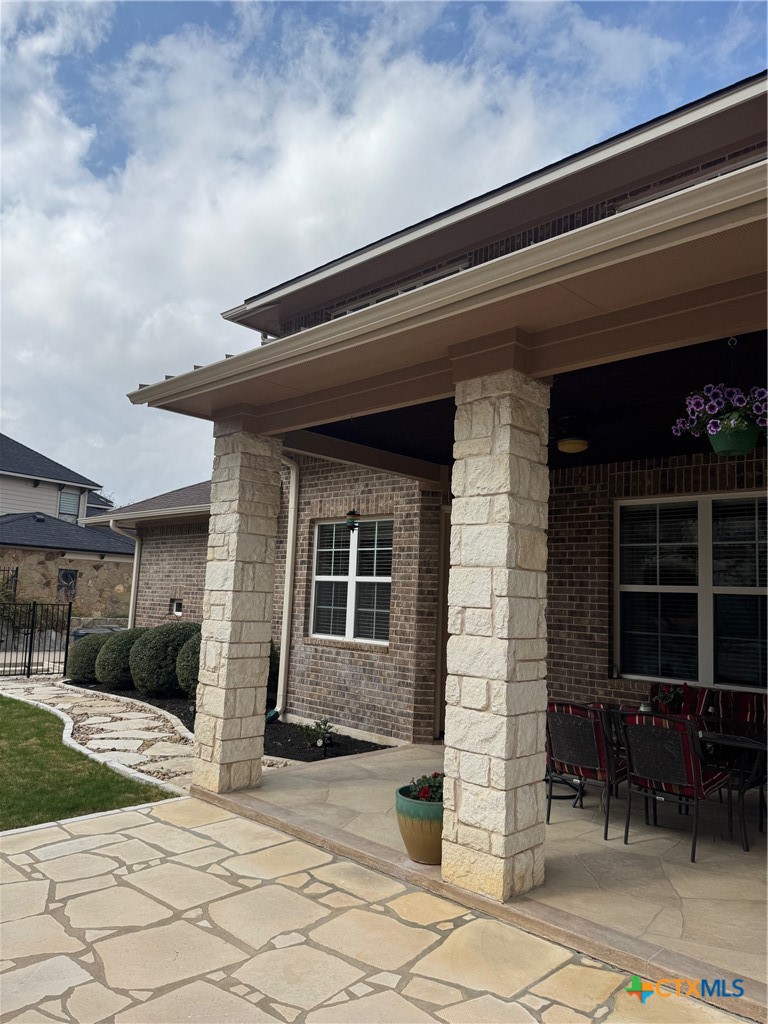 2306 Arroyo Grande Leander, TX 78641 - Photo 40 of 44 a front view of a house with outdoor seating