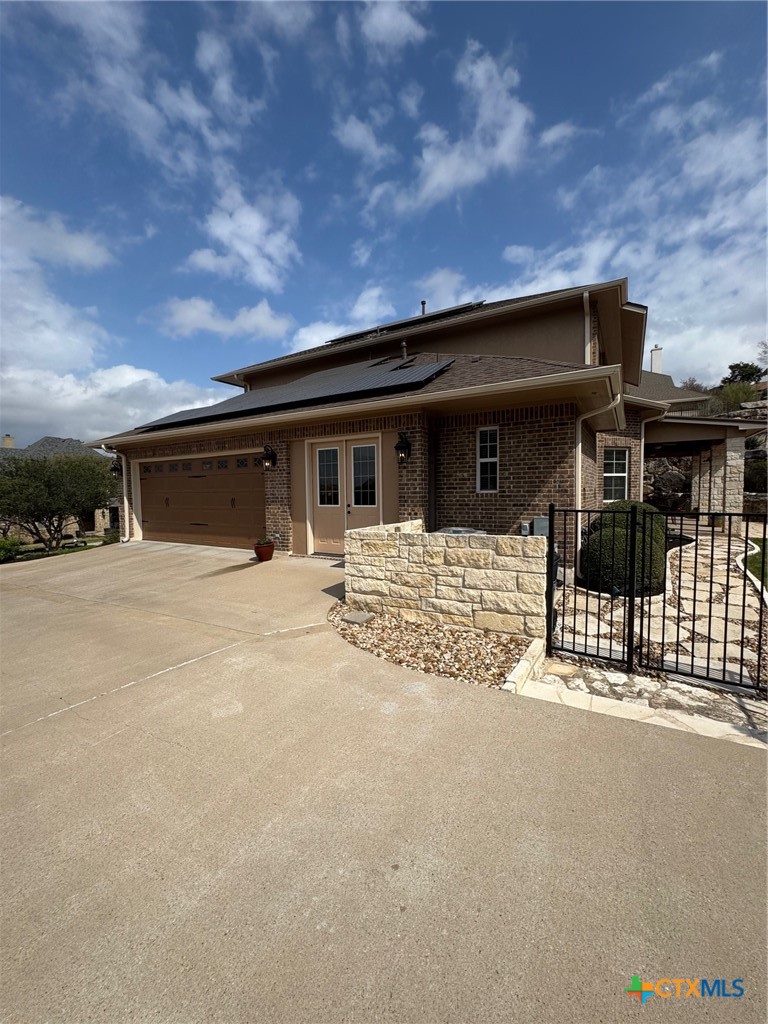 2306 Arroyo Grande Leander, TX 78641 - Photo 43 of 44 a front view of a house with glass top and outdoor space