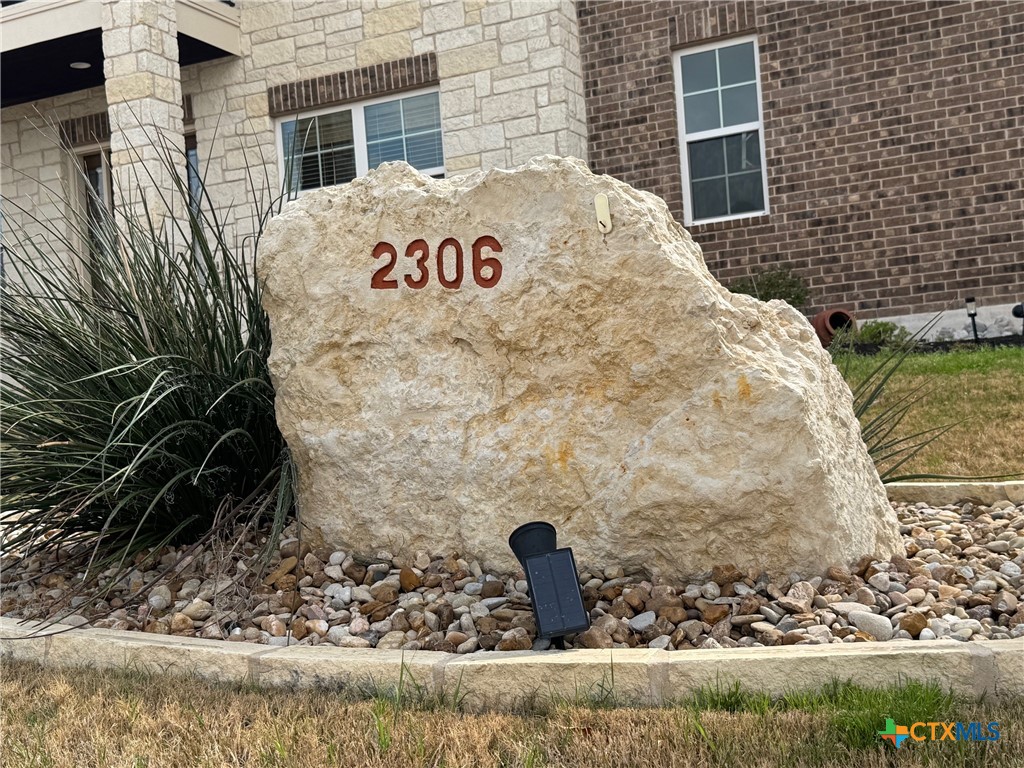 2306 Arroyo Grande Leander, TX 78641 - Photo 44 of 44 a sign that is on the side of a house