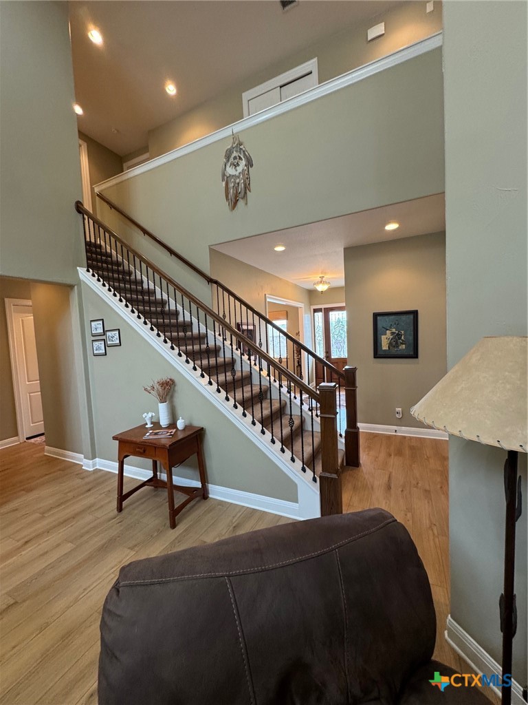 2306 Arroyo Grande Leander, TX 78641 - Photo 7 of 44 a lobby with furniture and stairs