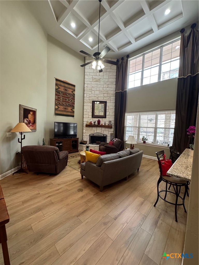 2306 Arroyo Grande Leander, TX 78641 - Photo 8 of 44 a living room with furniture windows and a fireplace
