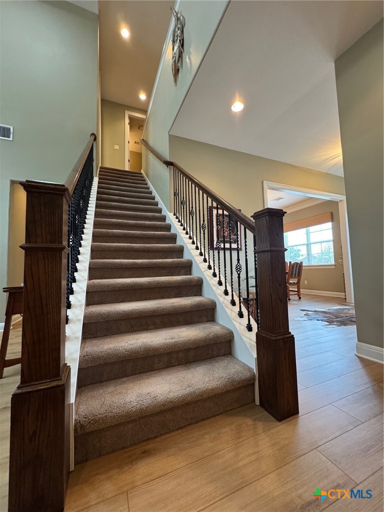 2306 Arroyo Grande Leander, TX 78641 - Photo 9 of 44 a view of entryway and hall with wooden floor