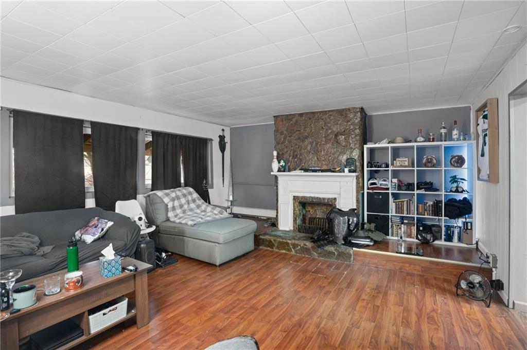 518 West Penn Street Butler, PA 16001 - Photo 3 of 14 a living room with furniture and a fireplace