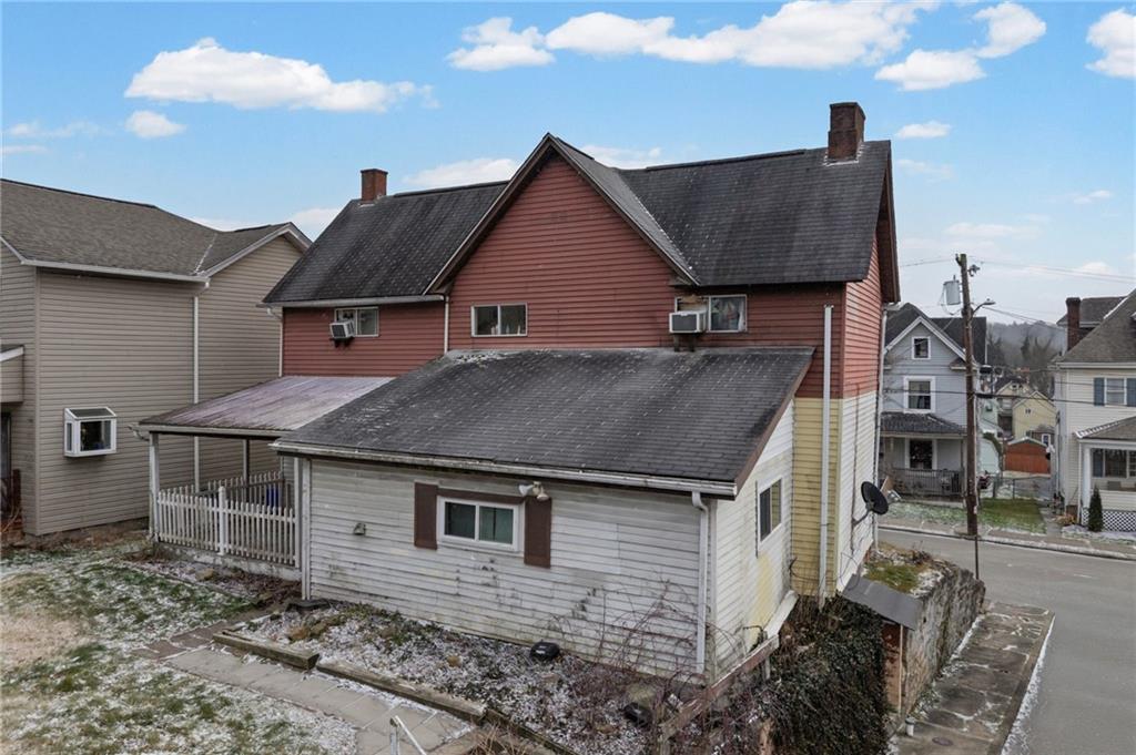 518 West Penn Street Butler, PA 16001 - Photo 10 of 14 a front view of a house with garden