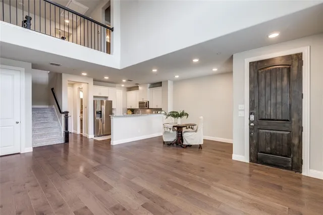 a view of kitchen with cabinets and stainless steel appliances