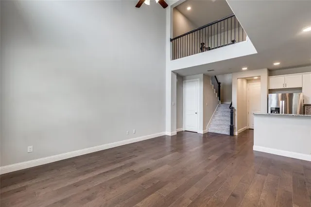 a view of an entryway with wooden floor