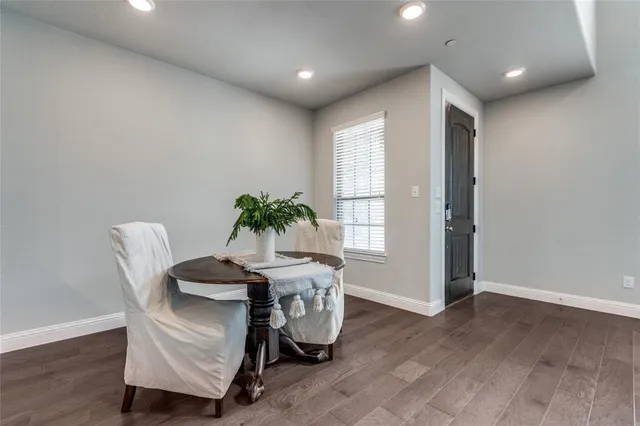 a workspace with furniture and a potted plant