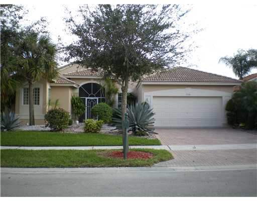 7738 Rinehart Drive Boynton Beach, FL 33437 - Photo 1 of 24 FRONT EXTERIOR