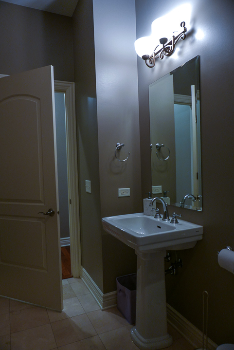 Undisclosed Address Chicago, IL 60607 - Photo 11 of 47 a bathroom with a sink and a mirror
