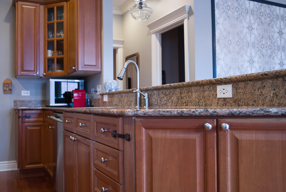 Undisclosed Address Chicago, IL 60607 - Photo 15 of 47 a kitchen with stainless steel appliances granite countertop a sink dishwasher and cabinets with wooden floor
