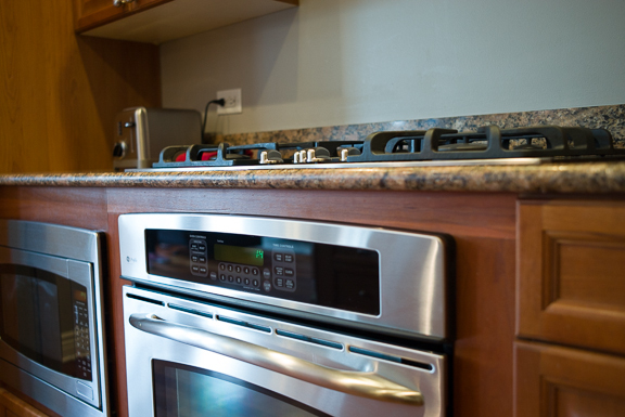 Undisclosed Address Chicago, IL 60607 - Photo 21 of 47 a stove top oven sitting inside of a kitchen