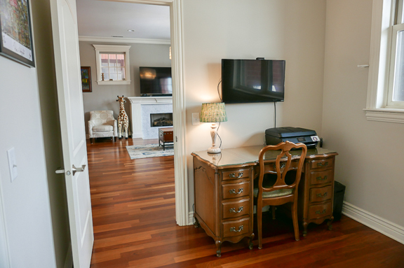 Undisclosed Address Chicago, IL 60607 - Photo 30 of 47 a bedroom with furniture and flat screen tv