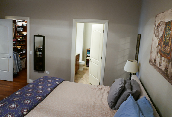 Undisclosed Address Chicago, IL 60607 - Photo 33 of 47 a bedroom with a bed and a lamp on desk