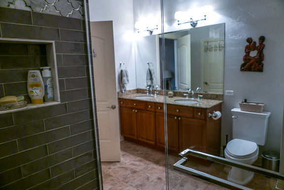 Undisclosed Address Chicago, IL 60607 - Photo 35 of 47 a bathroom with a sink a toilet and vanity