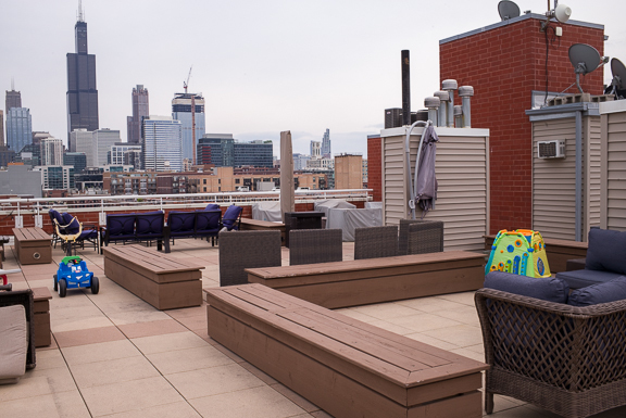 Undisclosed Address Chicago, IL 60607 - Photo 39 of 47 a outdoor living space with furniture and a couch