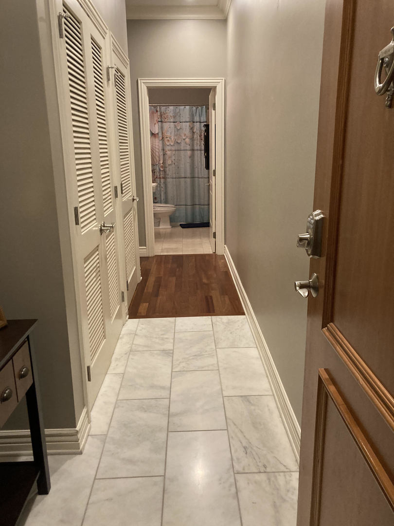 Undisclosed Address Chicago, IL 60607 - Photo 7 of 47 a bathroom with a sink and a shower