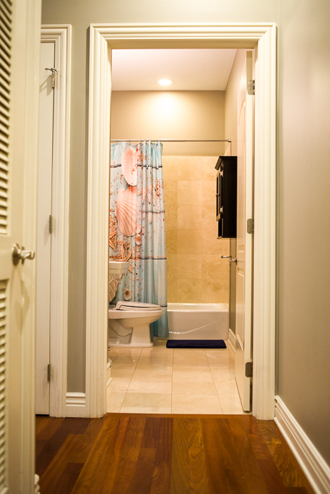 Undisclosed Address Chicago, IL 60607 - Photo 9 of 47 a bathroom with a glass shower door