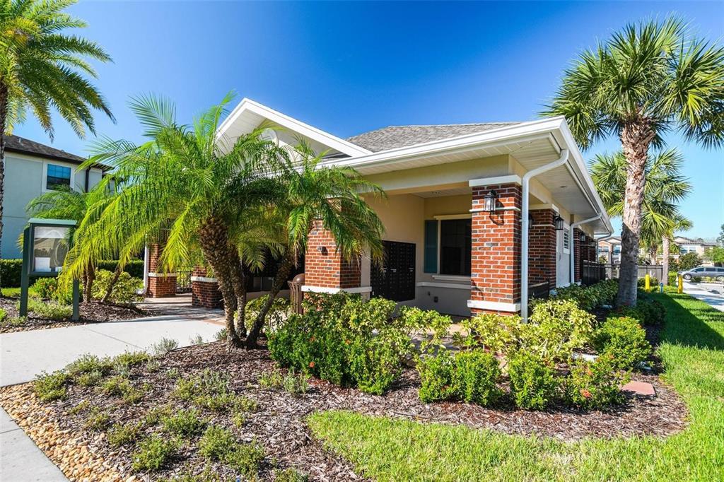 9152 Fox Sparrow Road Tampa, FL 33626 - Photo 31 of 32 a front view of house with small garden