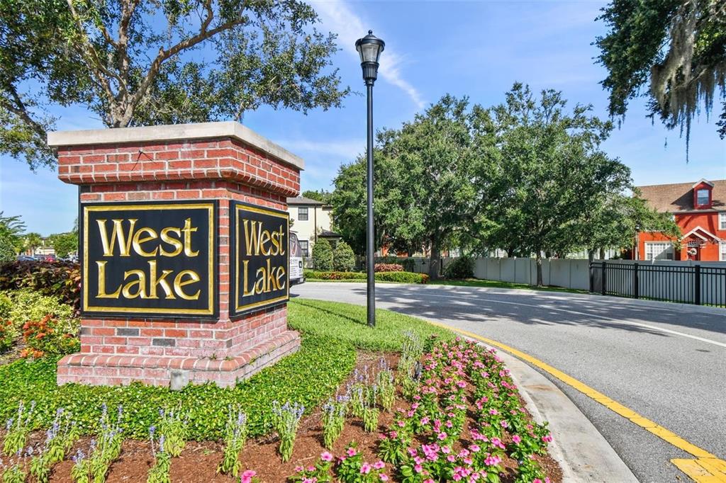 9152 Fox Sparrow Road Tampa, FL 33626 - Photo 32 of 32 a sign on the side of a building
