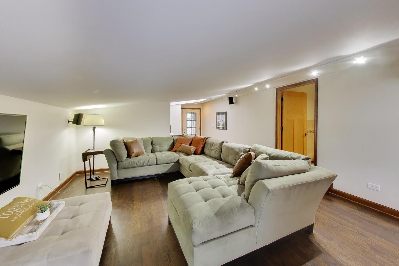 802 Lill Street Barrington, IL 60010 - Photo 15 of 27 a living room with furniture and a window