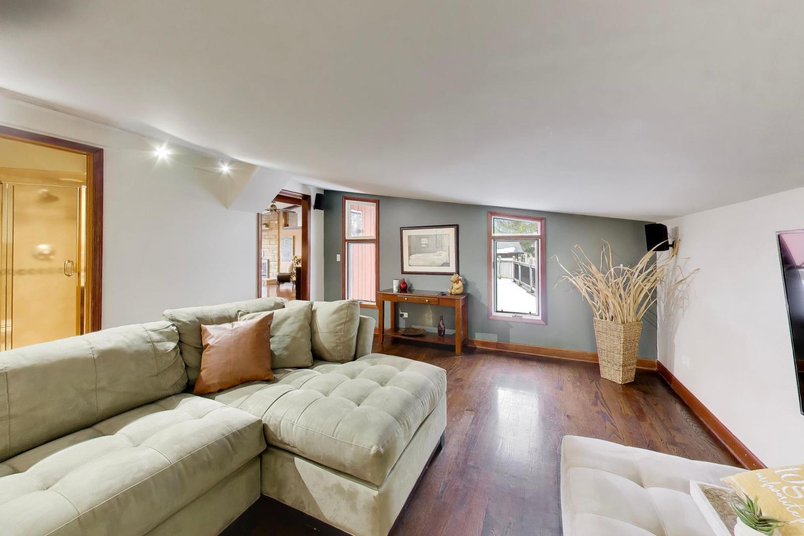 802 Lill Street Barrington, IL 60010 - Photo 17 of 27 a living room with furniture and a wooden floor