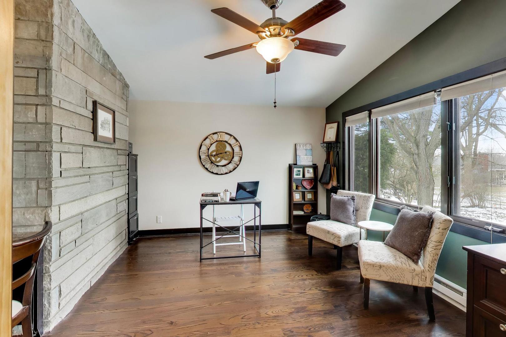 802 Lill Street Barrington, IL 60010 - Photo 20 of 27 a living room with furniture and a large window