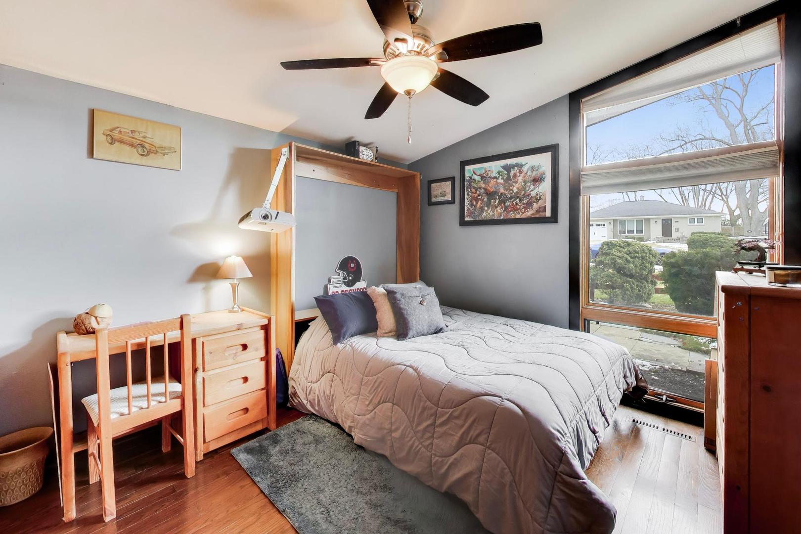 802 Lill Street Barrington, IL 60010 - Photo 23 of 27 a bedroom with a bed and a window