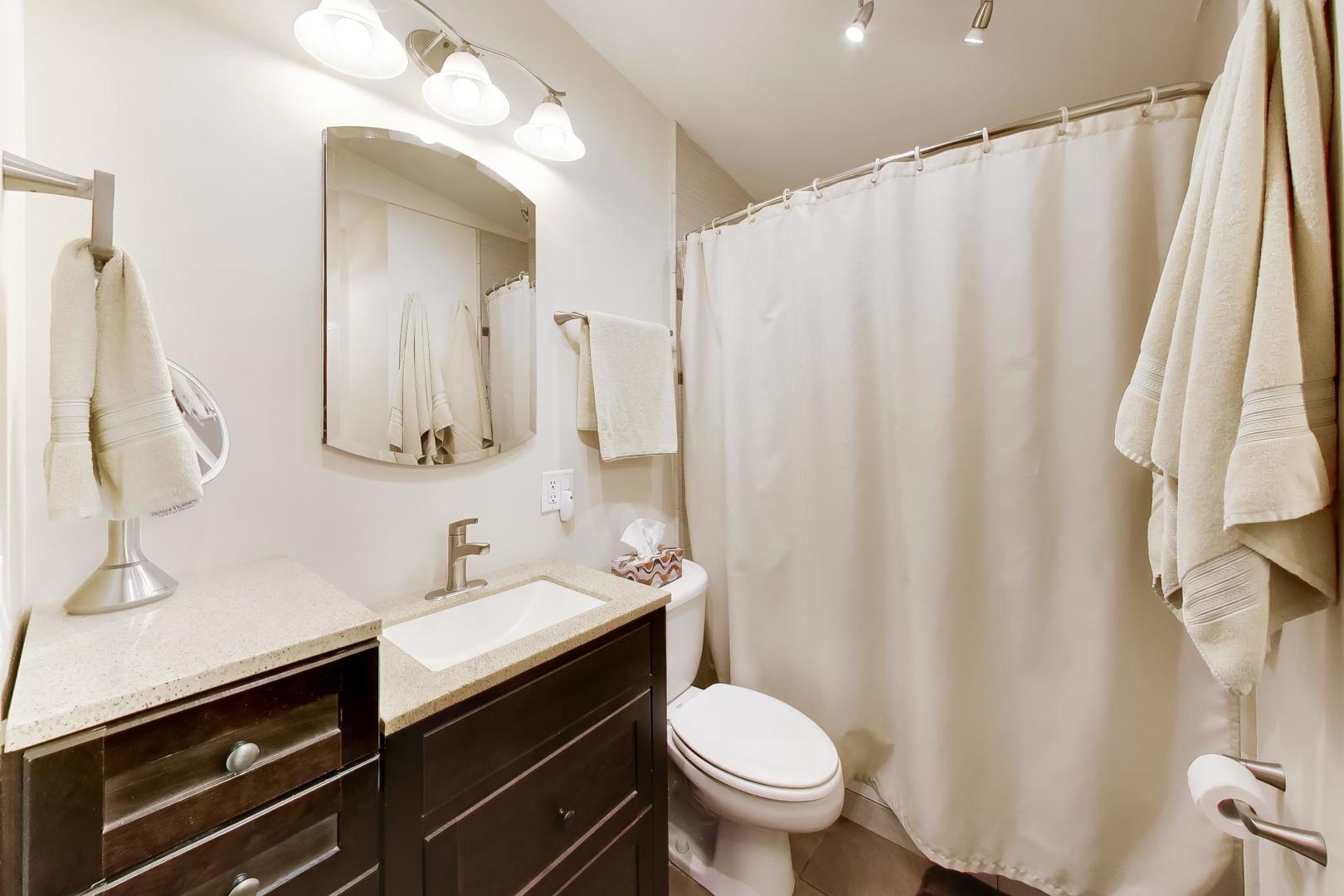 802 Lill Street Barrington, IL 60010 - Photo 25 of 27 a bathroom with a sink a toilet and a mirror