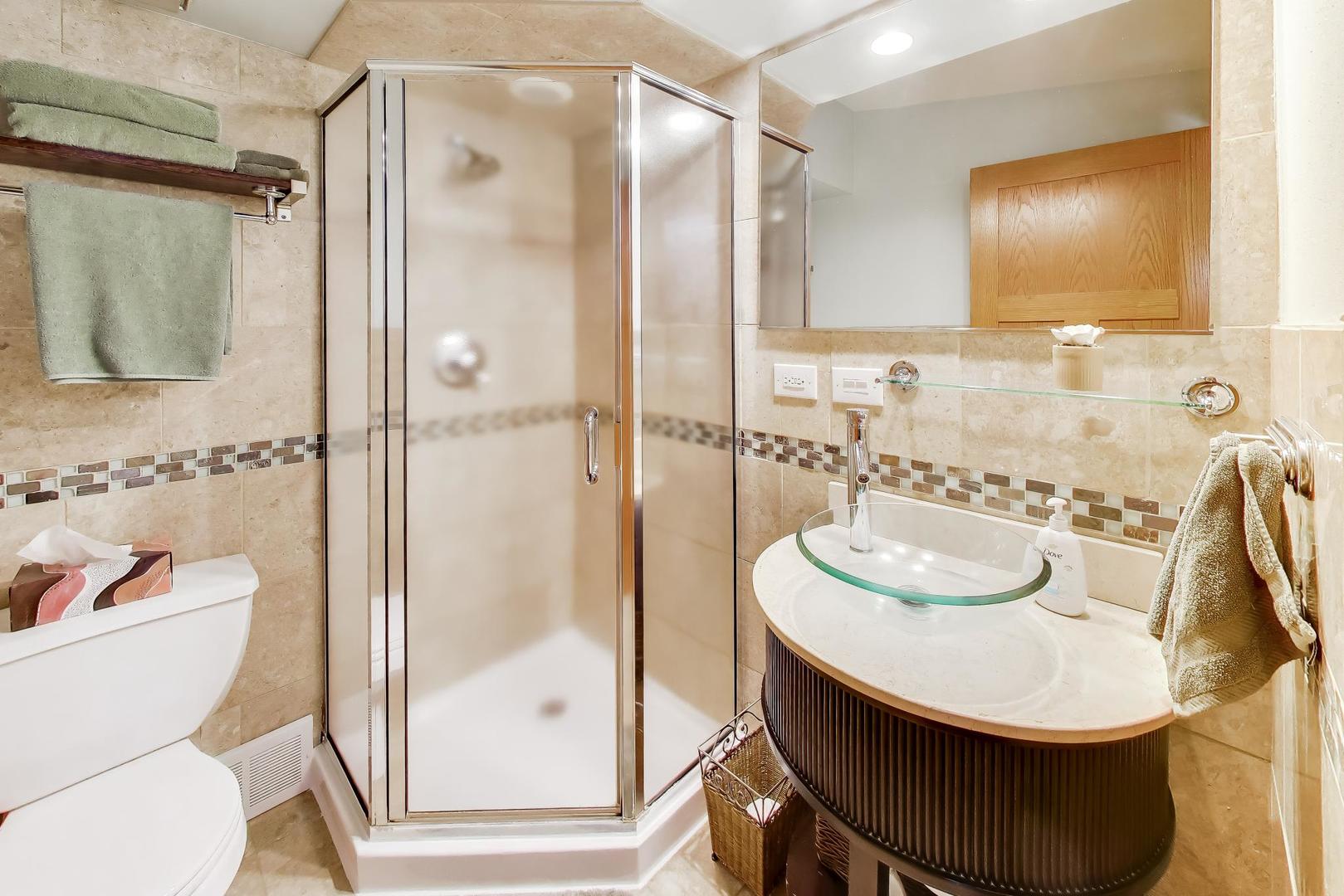 802 Lill Street Barrington, IL 60010 - Photo 27 of 27 a bathroom with a sink a toilet and shower