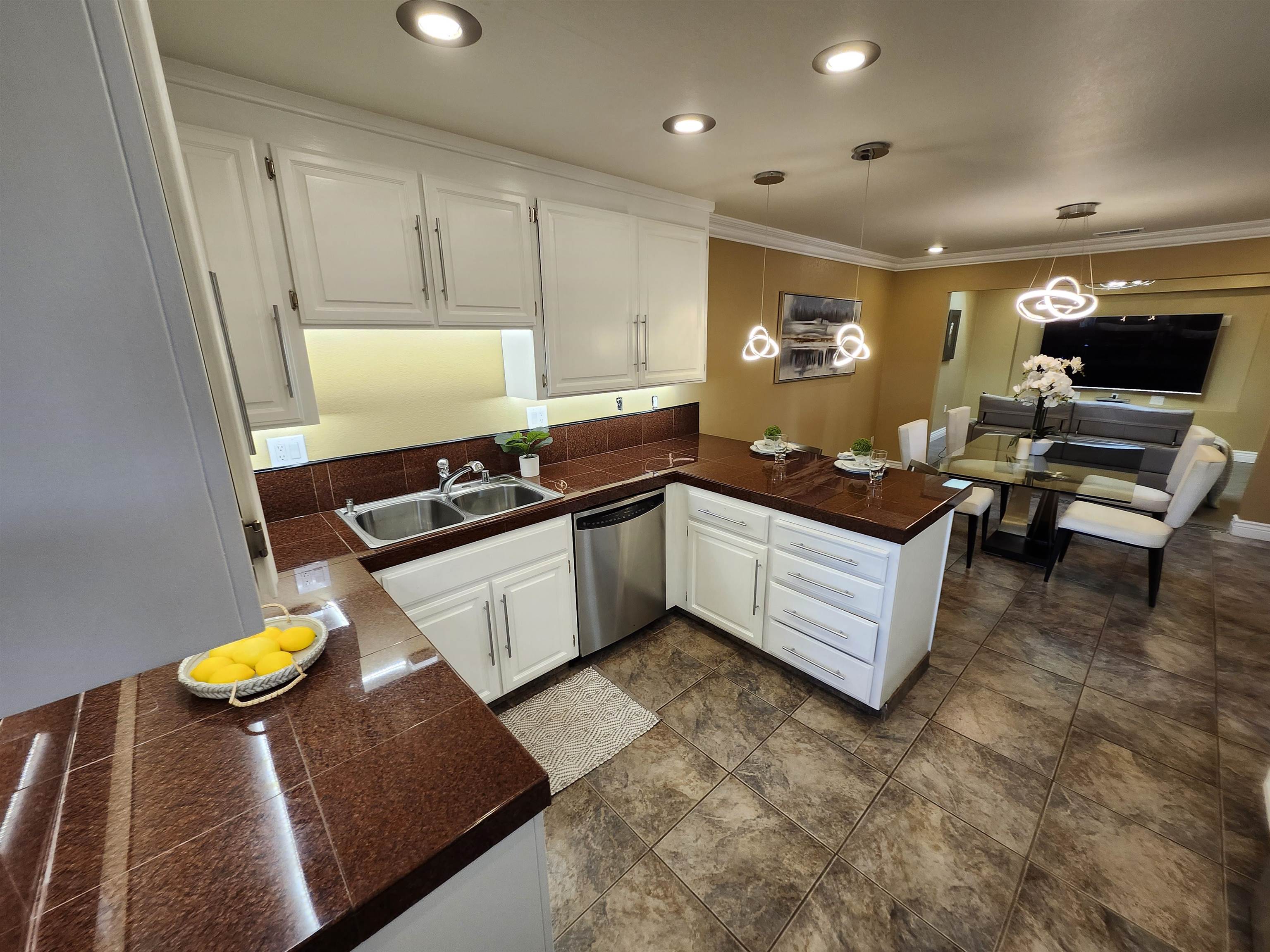 1823 Mockingbird Place Danville, CA 94526 - Photo 15 of 60 a kitchen with stainless steel appliances granite countertop a sink and a stove