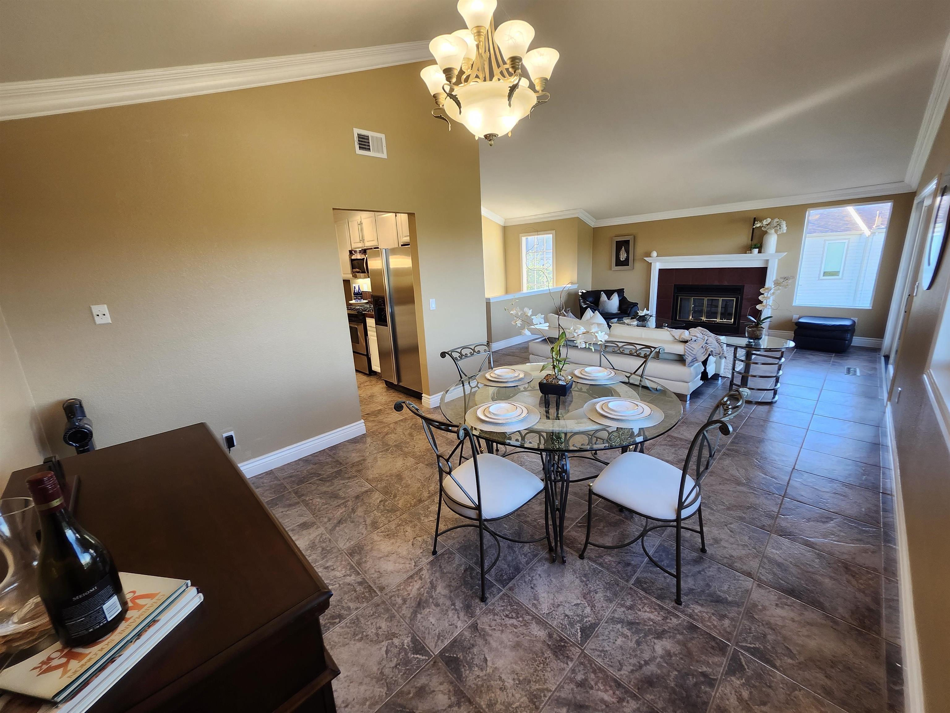 1823 Mockingbird Place Danville, CA 94526 - Photo 25 of 60 a view of a dining room with furniture and wooden floor