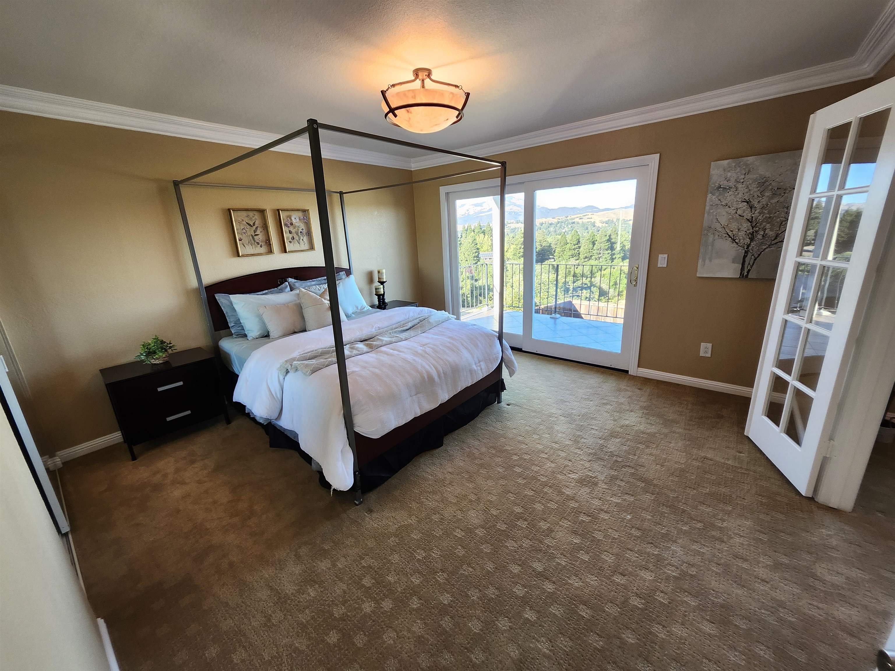 1823 Mockingbird Place Danville, CA 94526 - Photo 35 of 60 a bed room with a bed and a chandelier