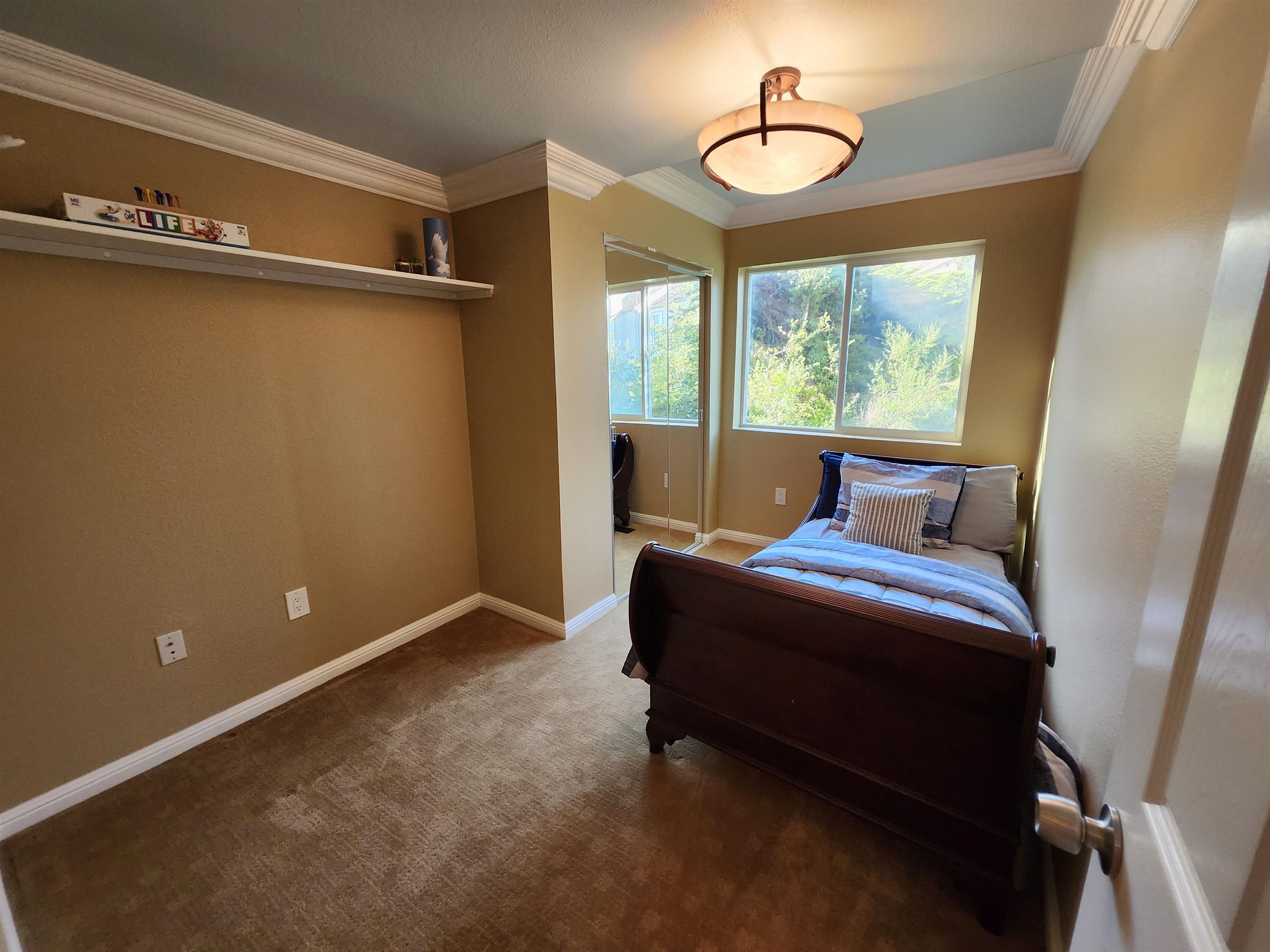 1823 Mockingbird Place Danville, CA 94526 - Photo 52 of 60 a bedroom with a bed and window