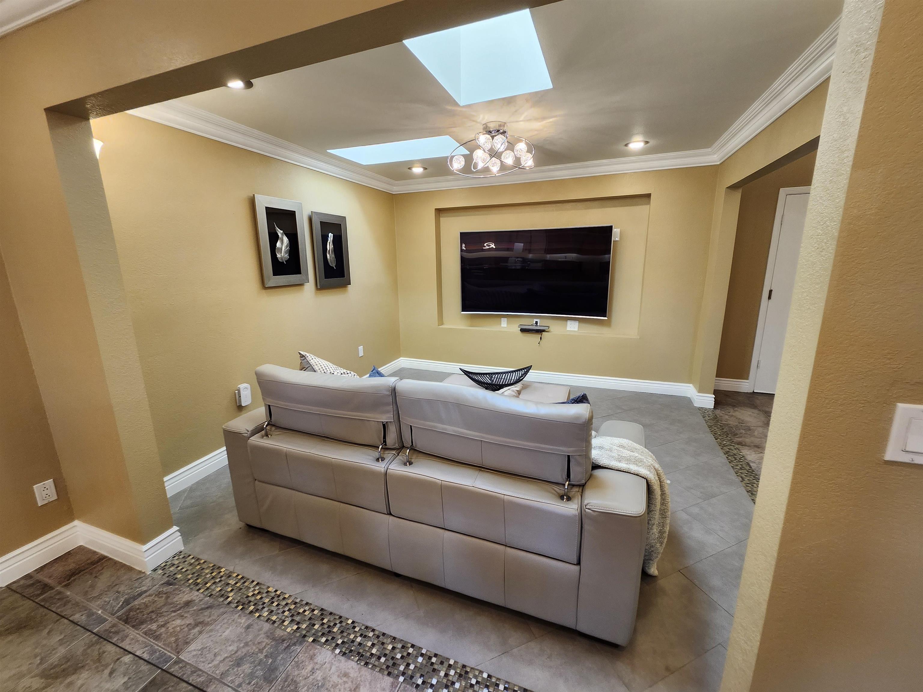 1823 Mockingbird Place Danville, CA 94526 - Photo 8 of 60 a living room with furniture and a flat screen tv