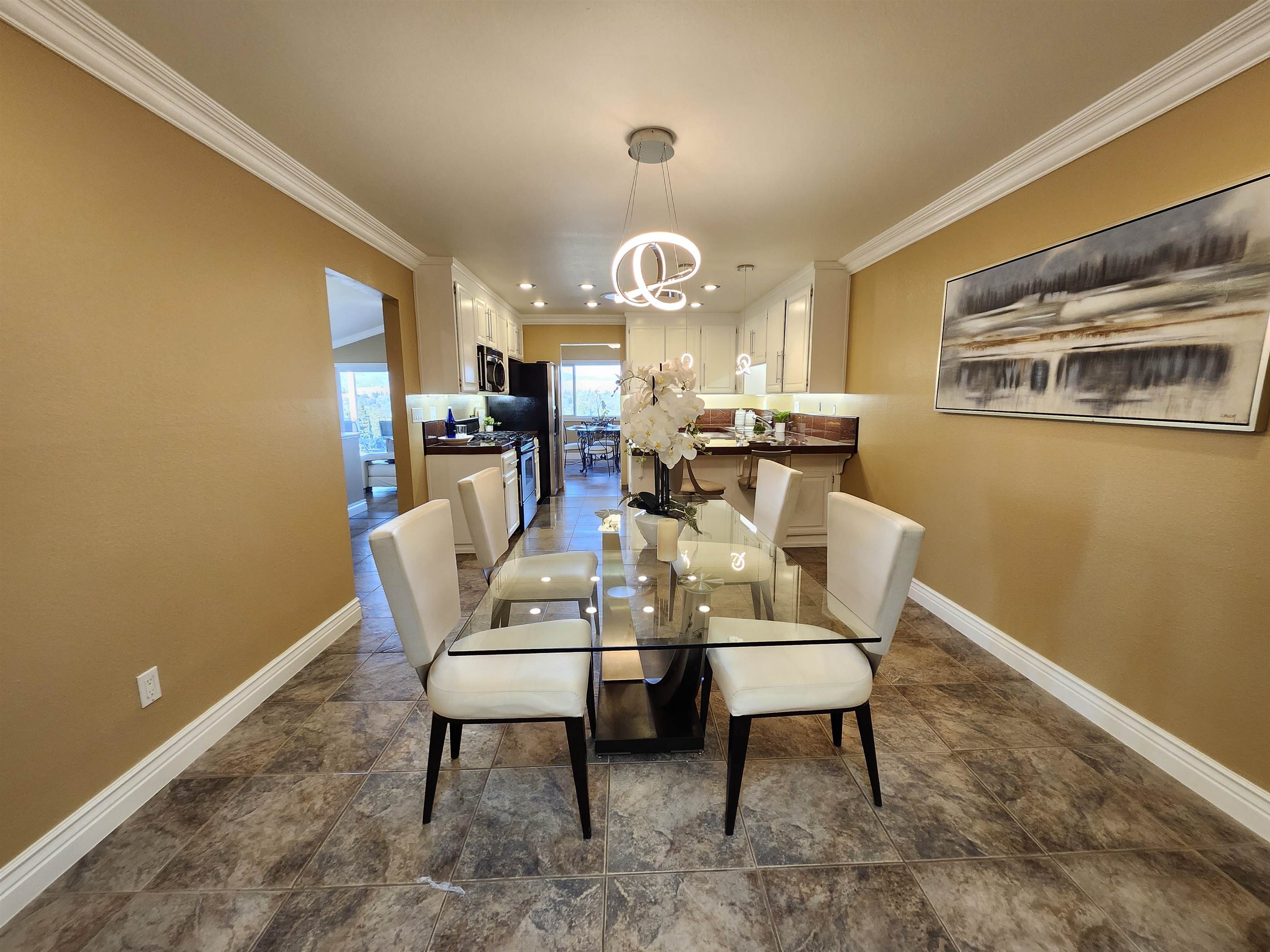 1823 Mockingbird Place Danville, CA 94526 - Photo 9 of 60 a view of a dining room with furniture and chandelier