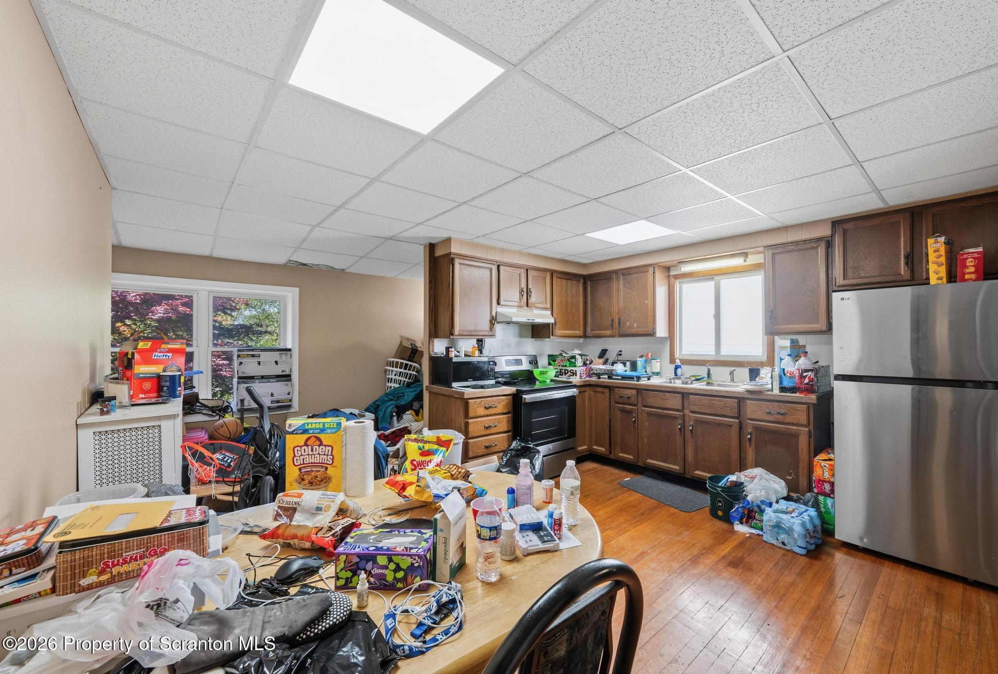 518 Prospect Avenue Scranton, PA 18505 - Photo 31 of 59 a room with furniture and a kitchen view