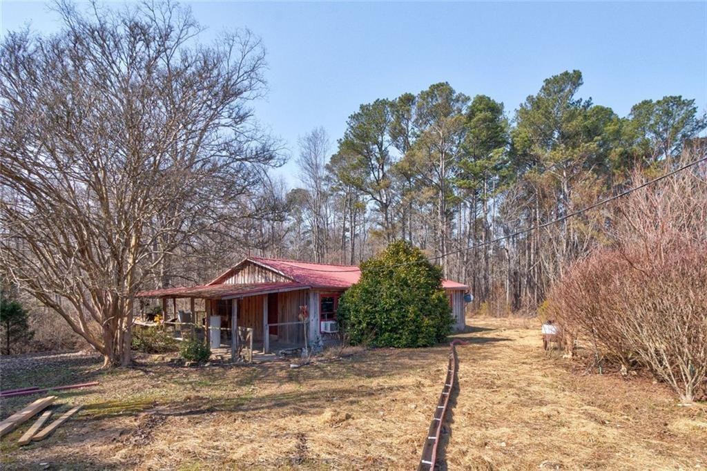 7315 Freeman Road Dawsonville, GA 30534 - Photo 11 of 28 a front view of a house with a yard